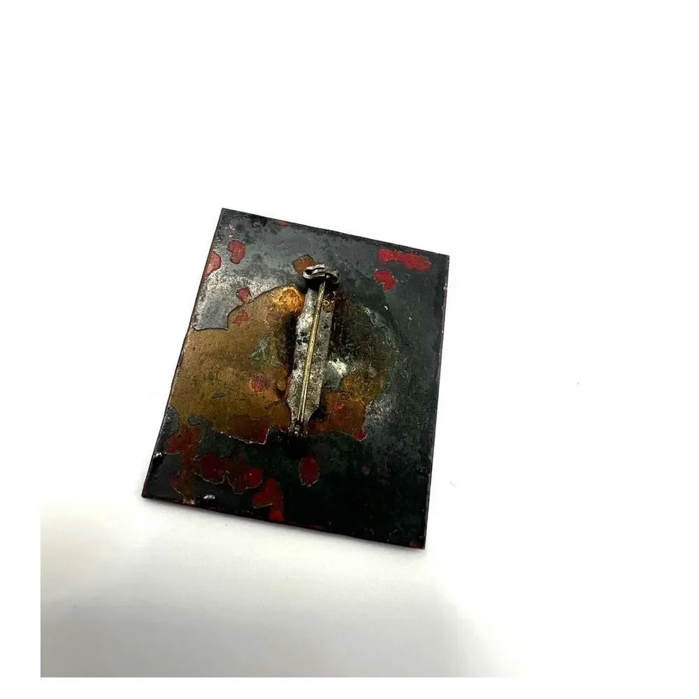 Metal hand painted brooch